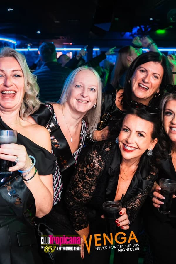 Dancing group in party dresses